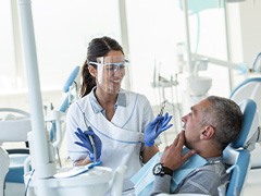 Dentist explaining treatment to patient