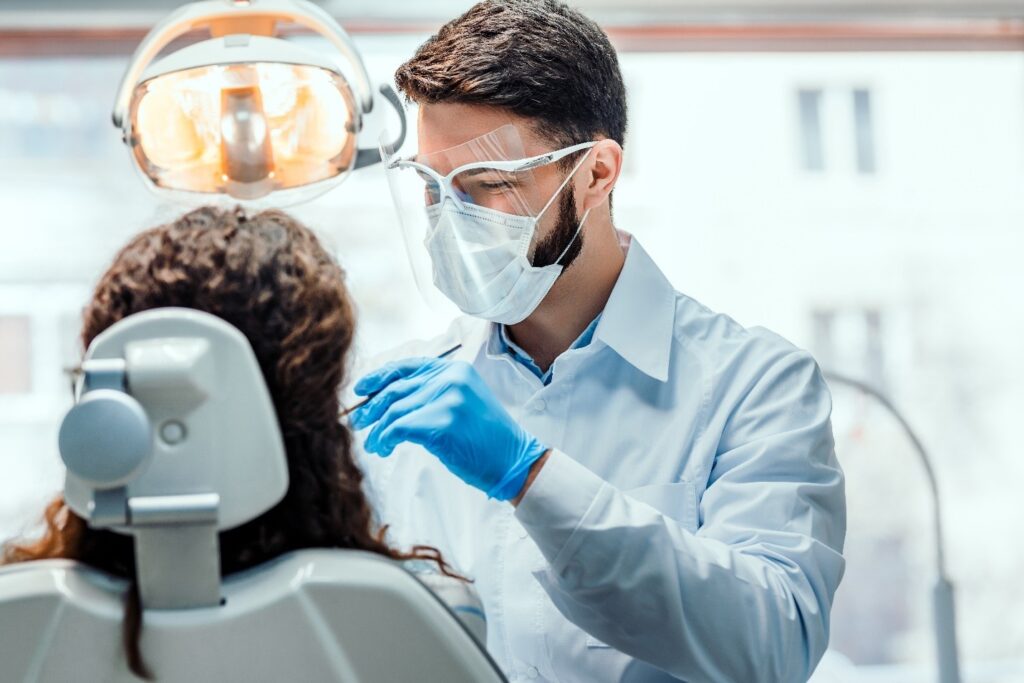 patient undergoing oral cancer screening 